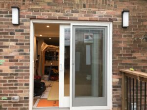 Replaced with 6' sliding door